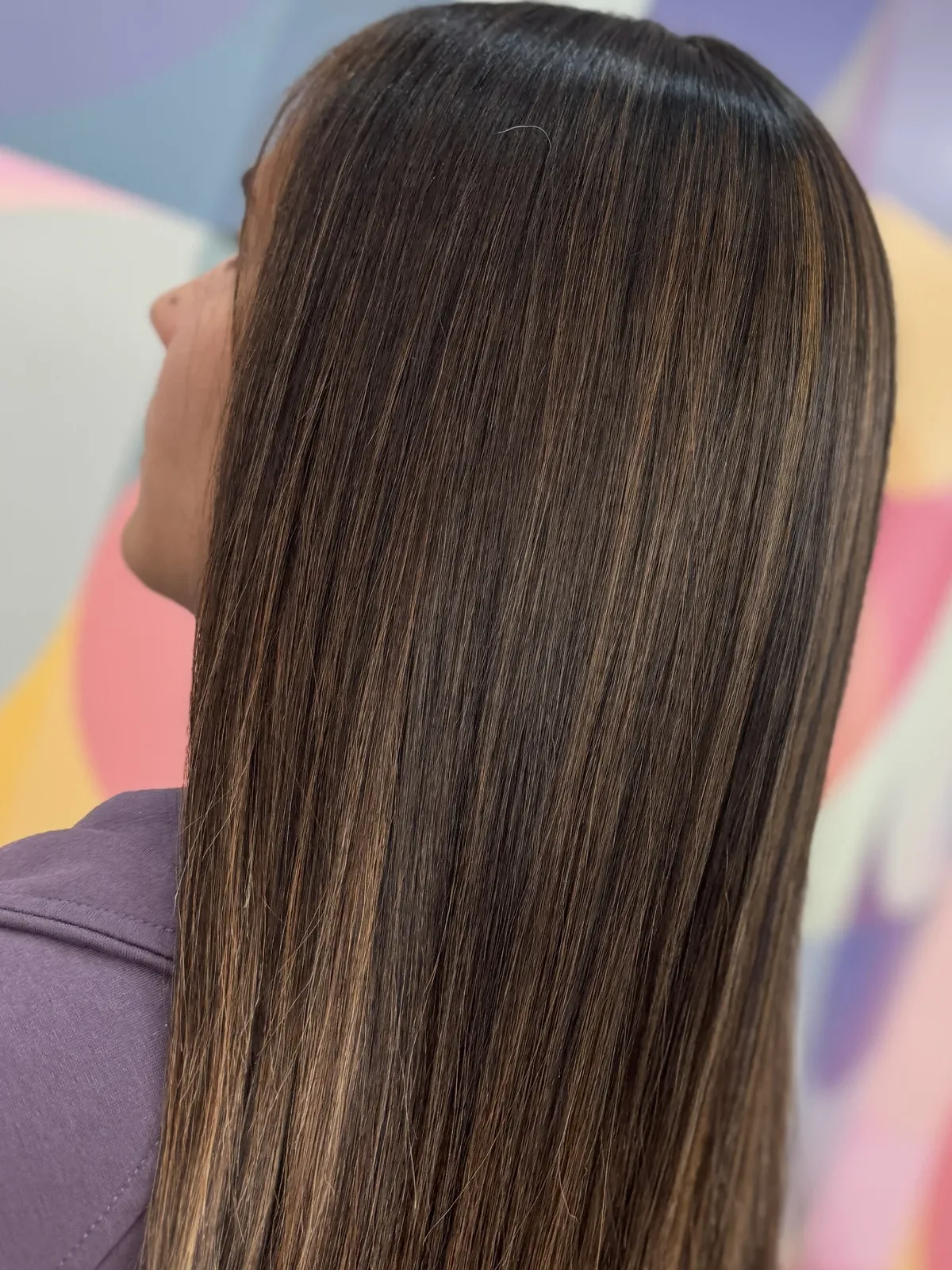 After anti-frizz smoothing treatment: smooth, glossy, straight brunette hair at Beyond Salon in Condado, San Juan