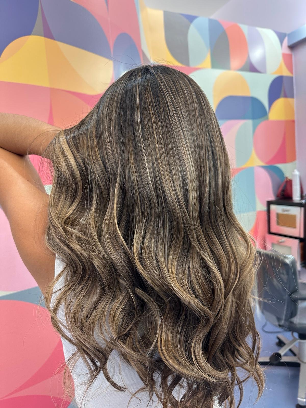 After: caramel balayage with soft waves, color correction by Yexsabell at Beyond Salon in Condado, San Juan