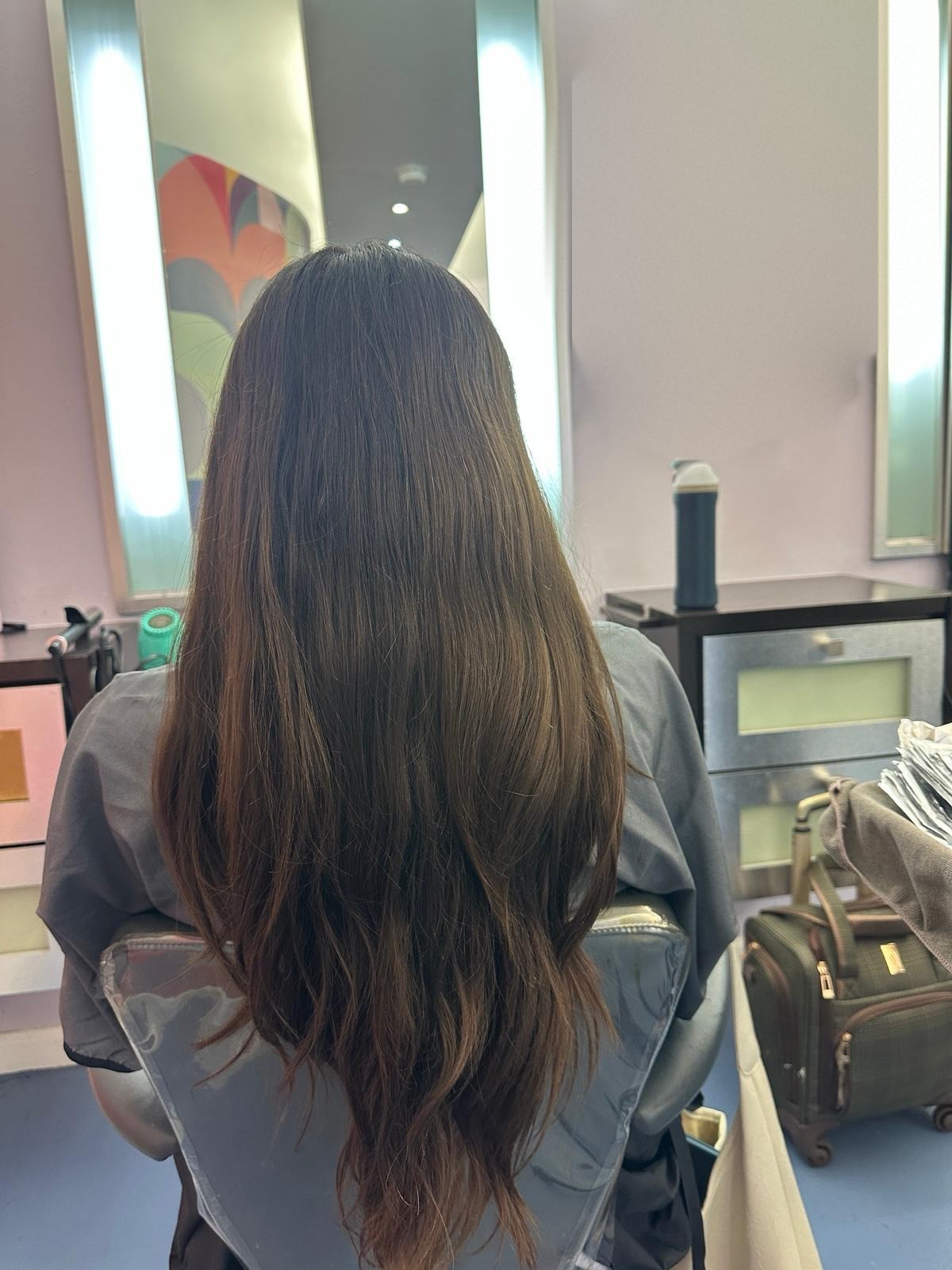 Before: brunette hair with long layers, before color correction at Beyond Salon in Condado, San Juan