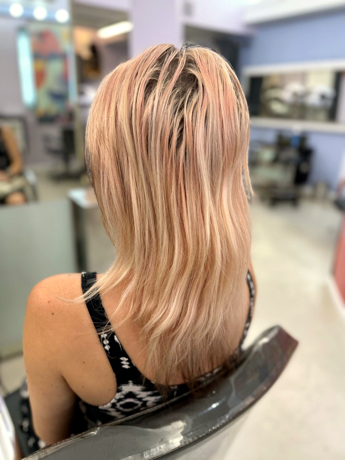 Before: long pink hair before a short textured pixie cut at Beyond Salon in Condado, San Juan