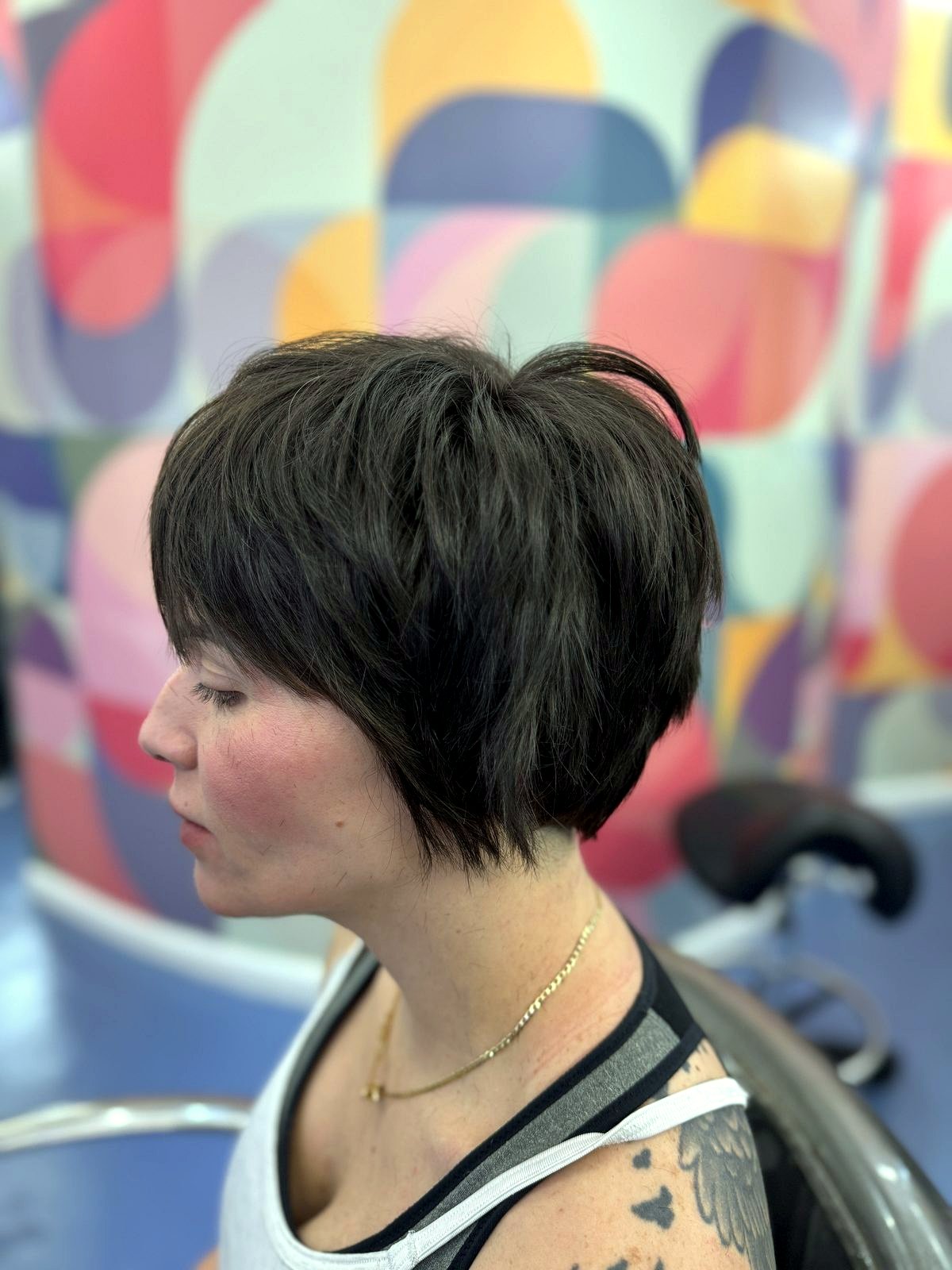 Textured dark pixie cut, side view, Beyond Salon Condado San Juan